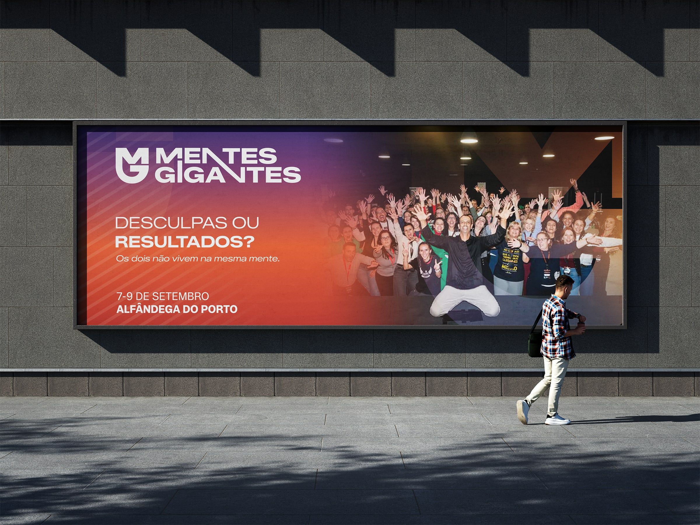 Event billboard on a street wall.