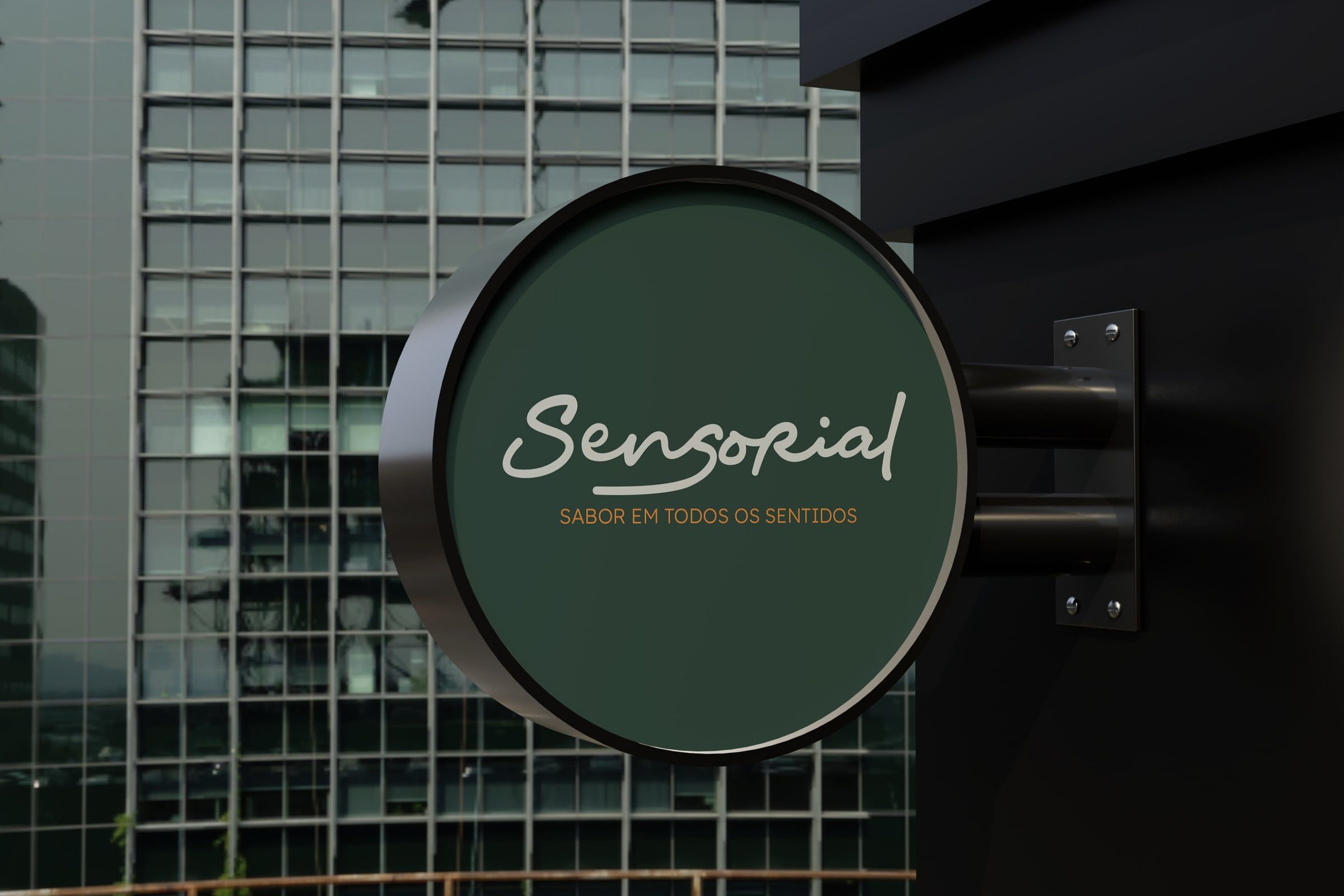 Circular exterior sign with the Sensorial logo.
